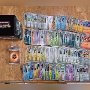 Pokemon misc card bundle 300 cards with Collectible tin